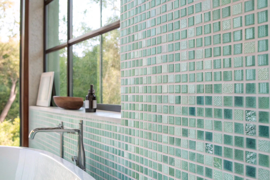 a-bathroom-floor-showing-a-decorative-mosaic-borde