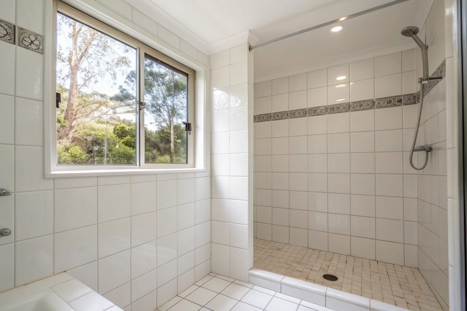 a-freshly-repaired-and-retiled-shower-recess-in-a- Completed shower leak repair with new tiles and waterproofing in Lake Macquarie bathroom